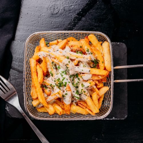tasty-french-fries-with-sauce